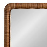 Close-up of a light brown wooden frame with rounded corners and a carved ribbed texture surrounding a smooth reflective mirror surface