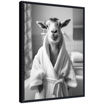 Black and white framed canvas art of Sylvie Goat wearing a towel bathrobe by The Creative Bunch Studio