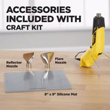 Yellow Wagner FURNO micro heat gun with black accents standing on a wooden surface, accompanied by two metal nozzles labeled reflector and flare, and an 8x8 inch gray silicone mat.
