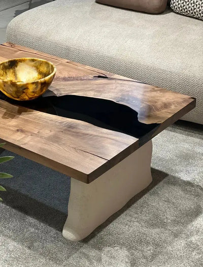 Handcrafted epoxy resin walnut coffee table with stone-inspired wooden legs