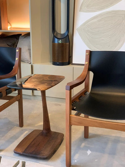 C-shaped luxury resin end table made of solid walnut wood with clear epoxy resin finish