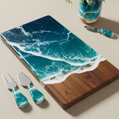 Handcrafted walnut charcuterie board with ocean resin waves and four matching walnut-handled cheese knives