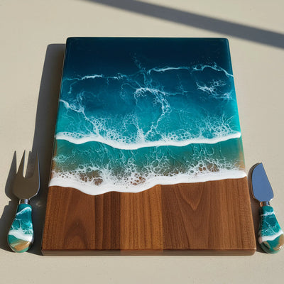 Handcrafted walnut charcuterie board with ocean resin waves and four matching walnut-handled cheese knives