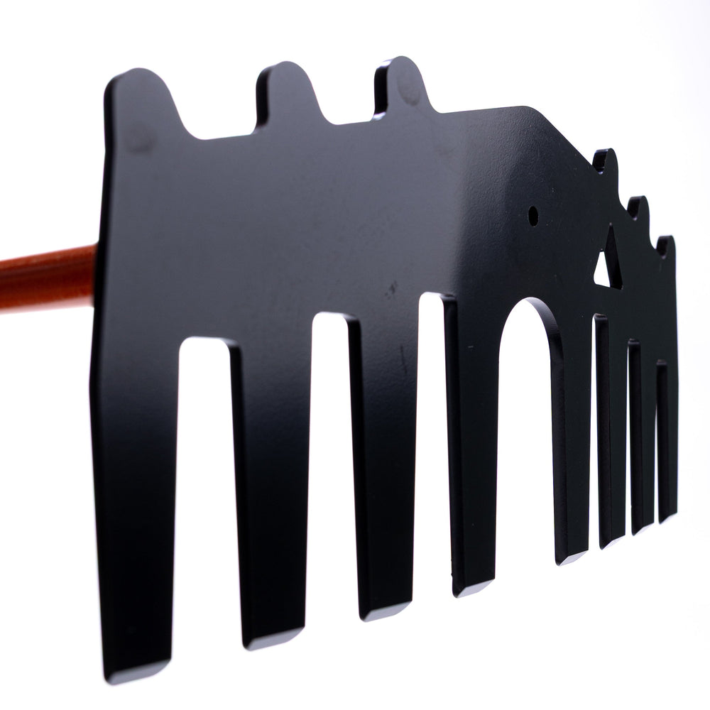 Weston rake showing steel head and wooden handle assembled, displayed outdoors