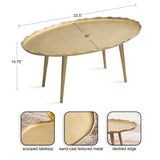 Oval coffee table with a sand-cast textured metal surface, scooped tabletop, and deckled edge, supported by four tapered legs, shown with measurements.