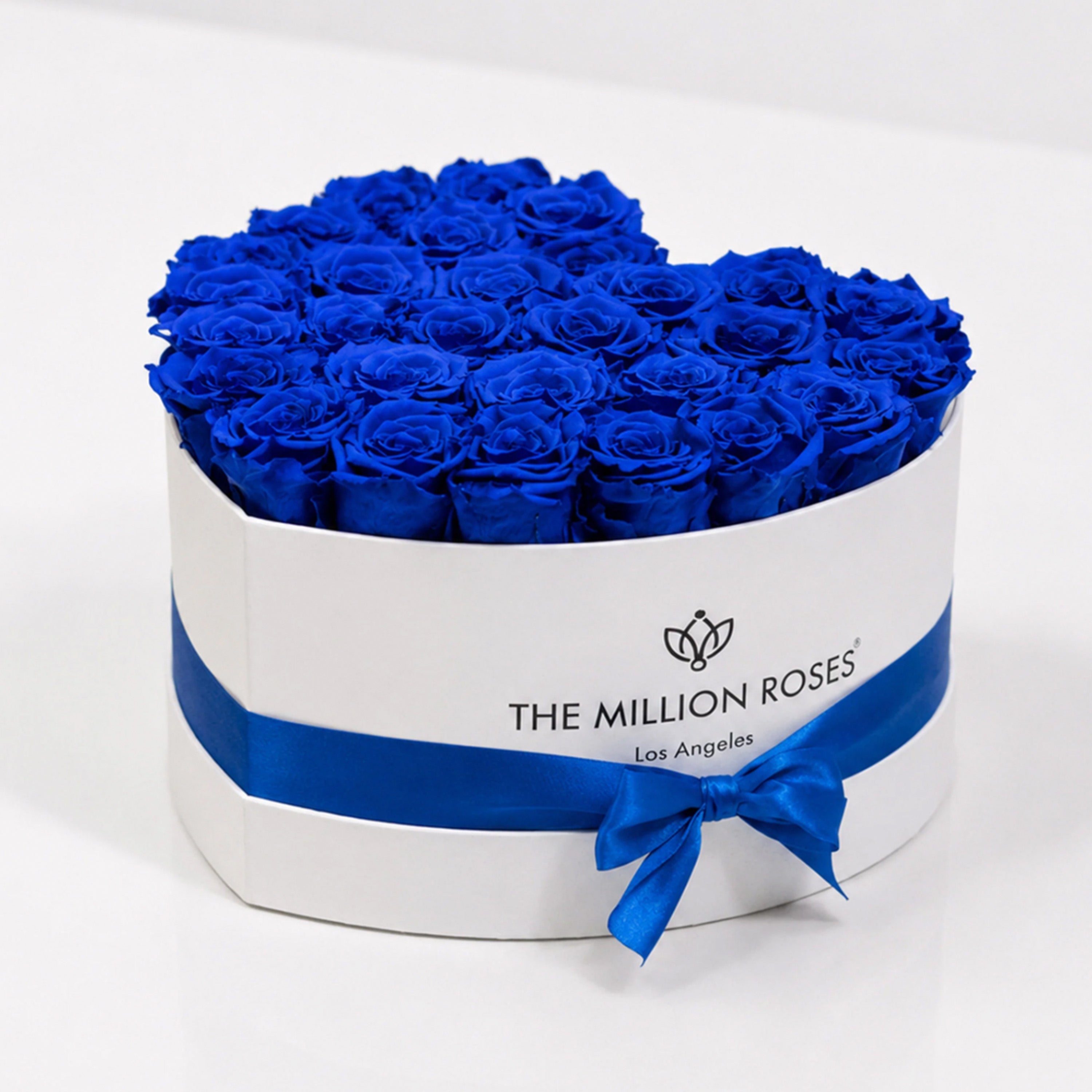 Heart White Box filled with royal blue roses