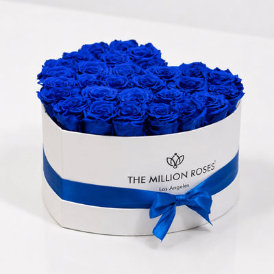 Heart White Box filled with royal blue roses