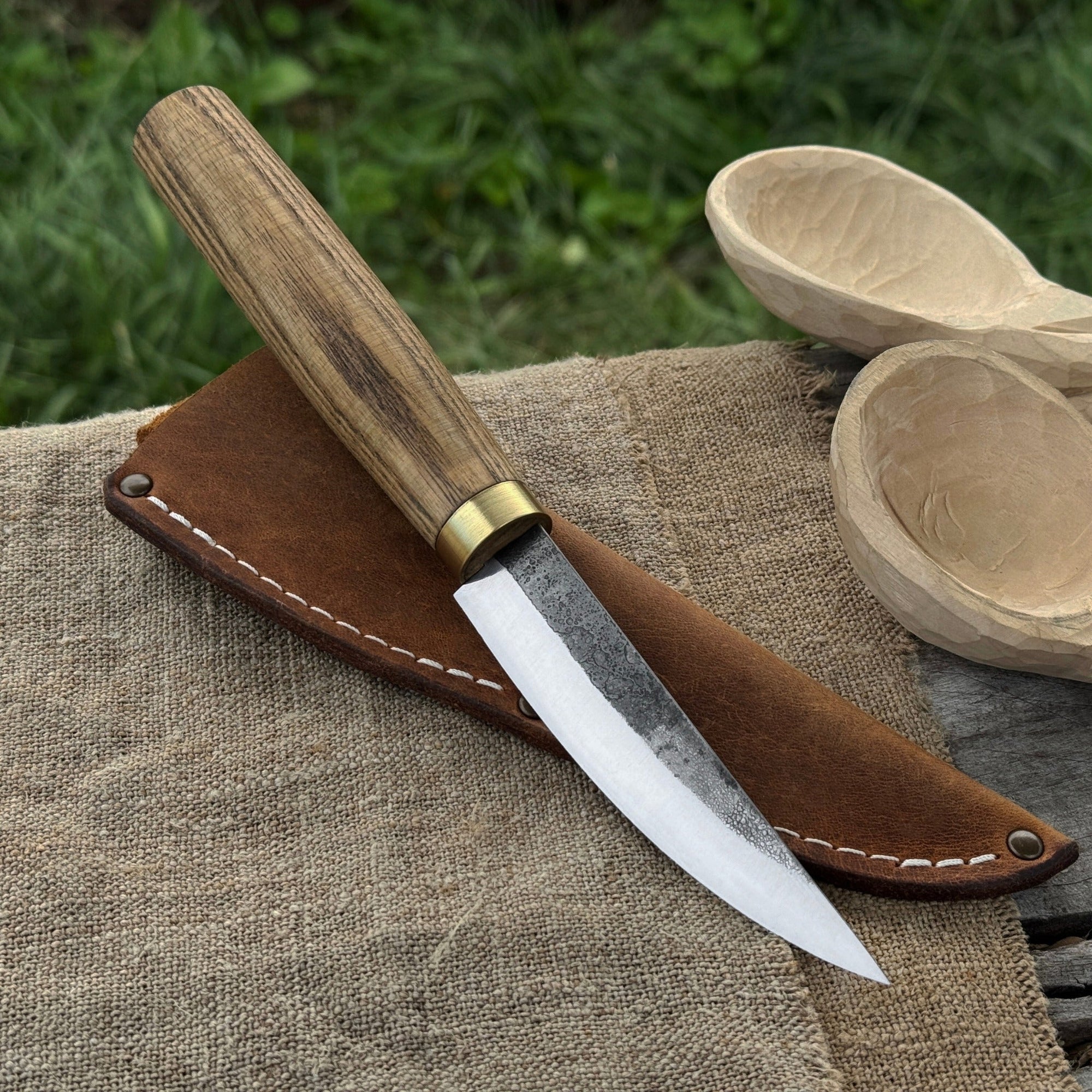 Hand-forged whittling sloyd knife with 10 cm carbon steel blade and leather sheath