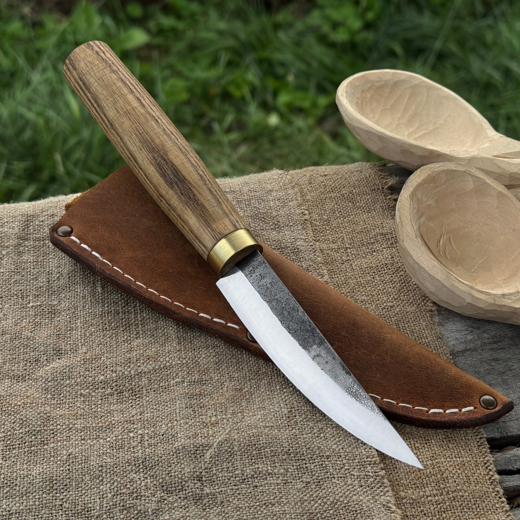 Hand-forged whittling sloyd knife with 10 cm carbon steel blade and leather sheath