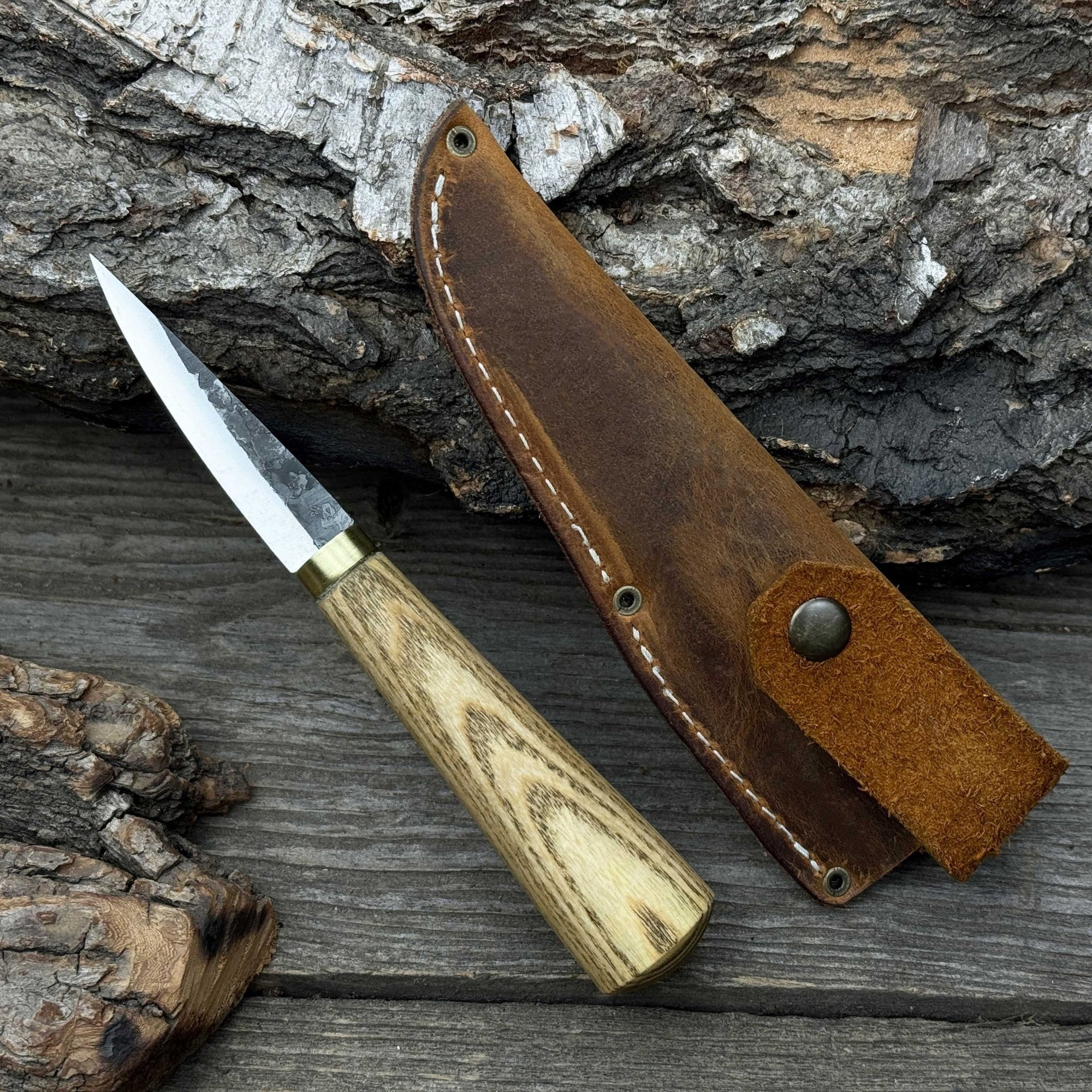 Hand-forged whittling sloyd knife with leather sheath and ash wood handle