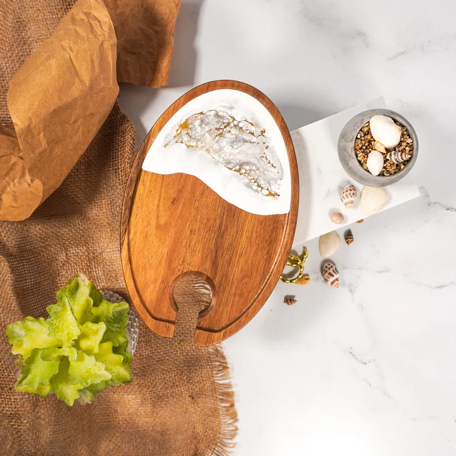 Wine & Appetizer Tray with marble-like design on a white surface with bread and greenery.