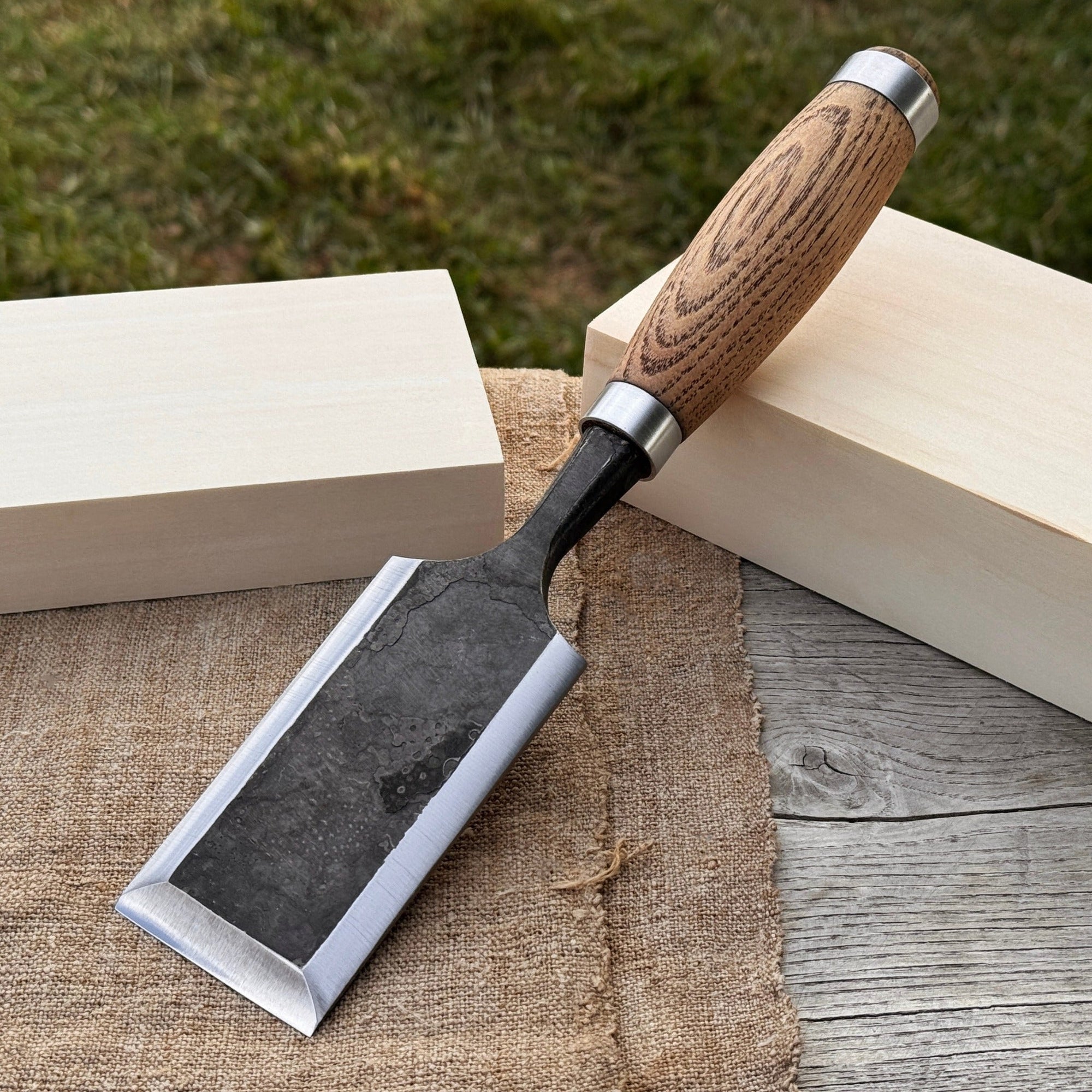 Hand-forged wood carving chisel with ash wood handle and carbon steel blade