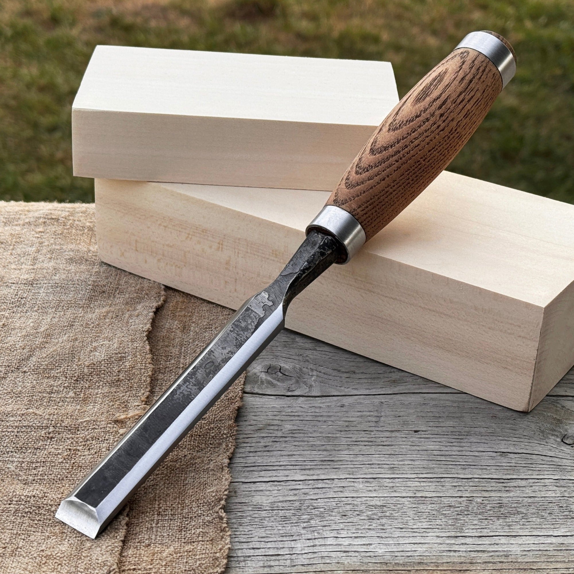 Hand-forged wood carving chisel with ash handle and carbon steel blade