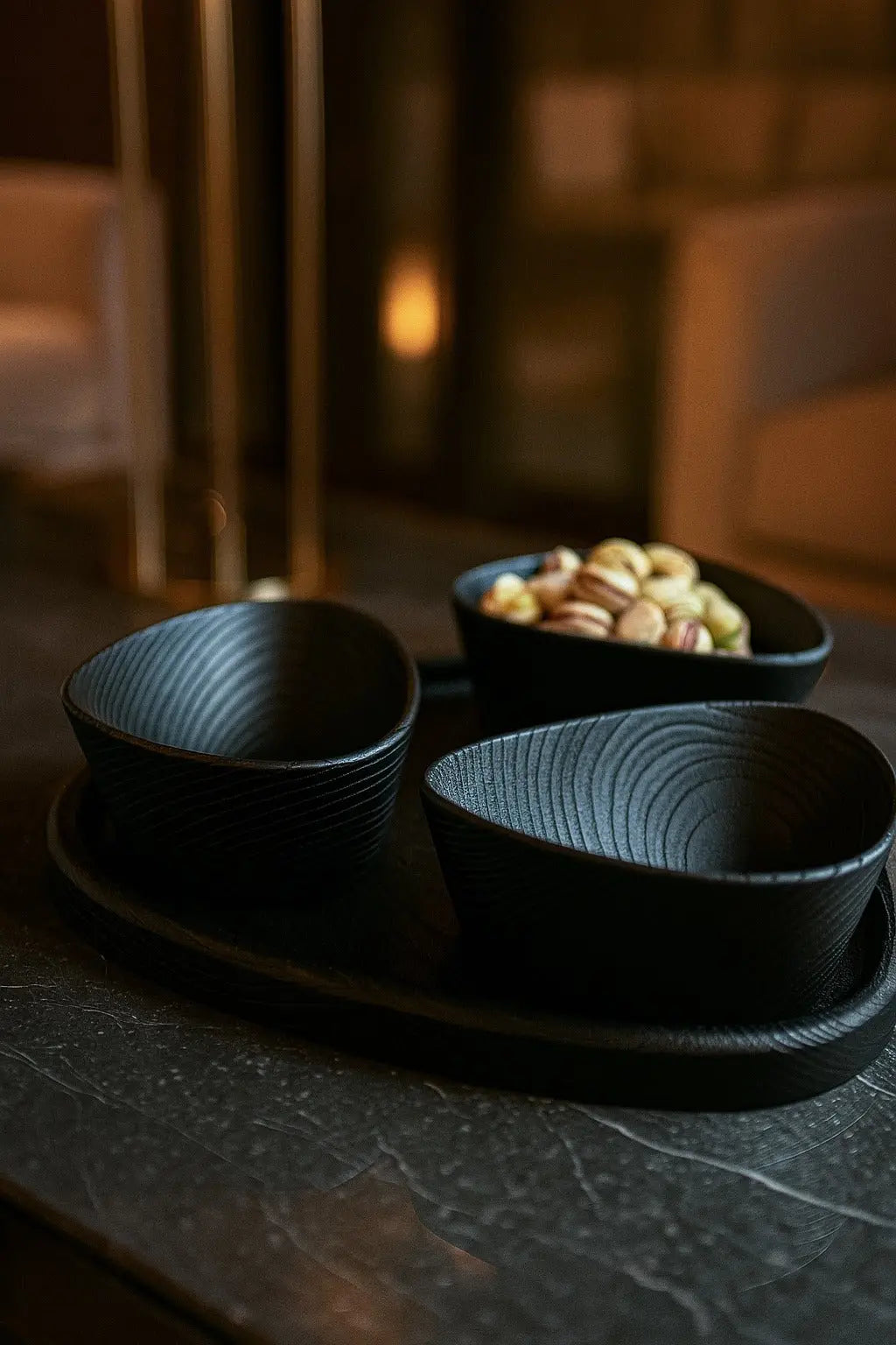 Set of handcrafted wooden nut bowls with tray showing natural wood grain and sandblasted texture