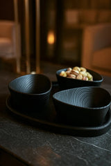 Set of handcrafted wooden nut bowls with tray showing natural wood grain and sandblasted texture