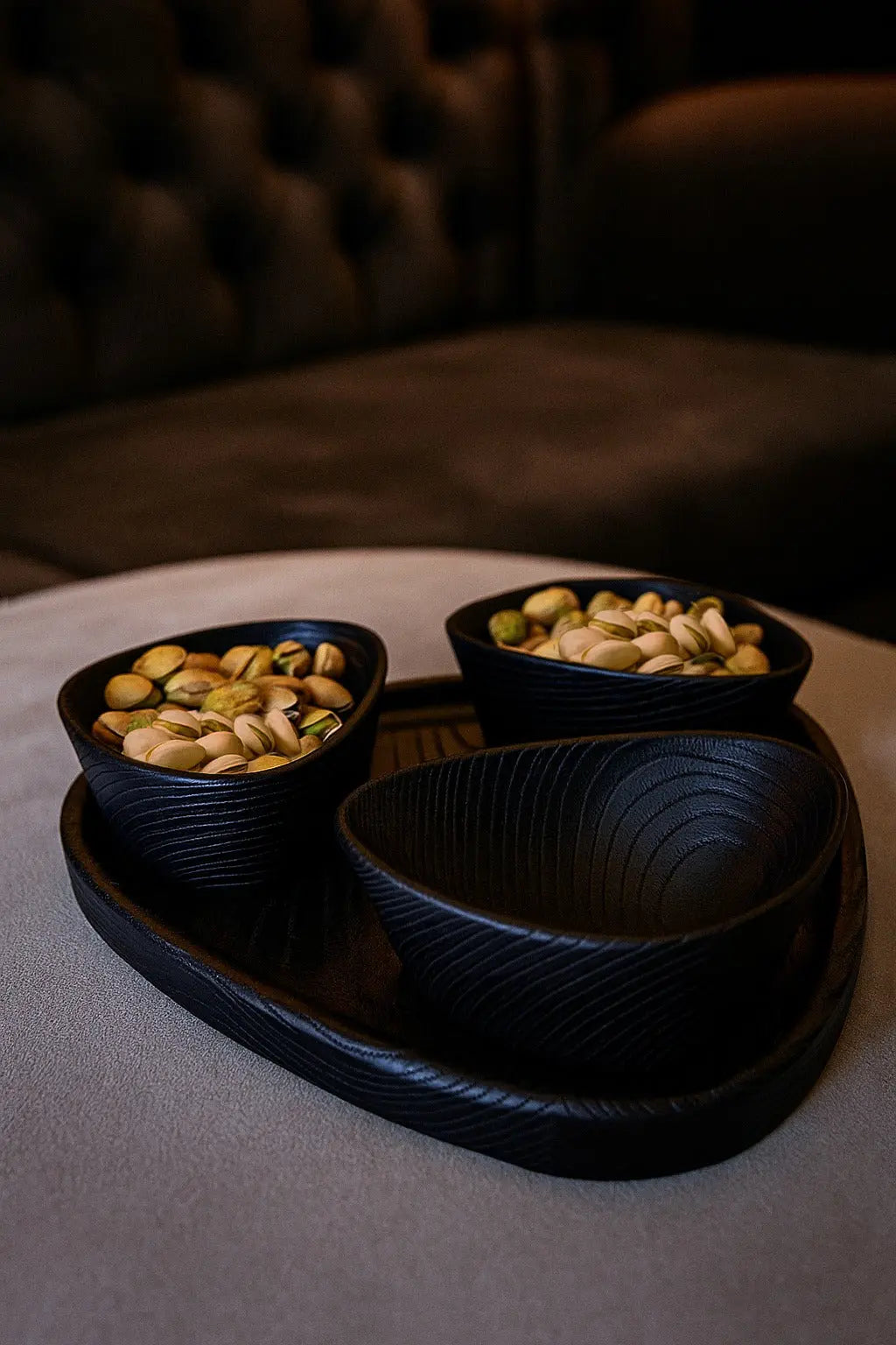Set of handcrafted wooden nut bowls with tray showing natural wood grain and sandblasted texture