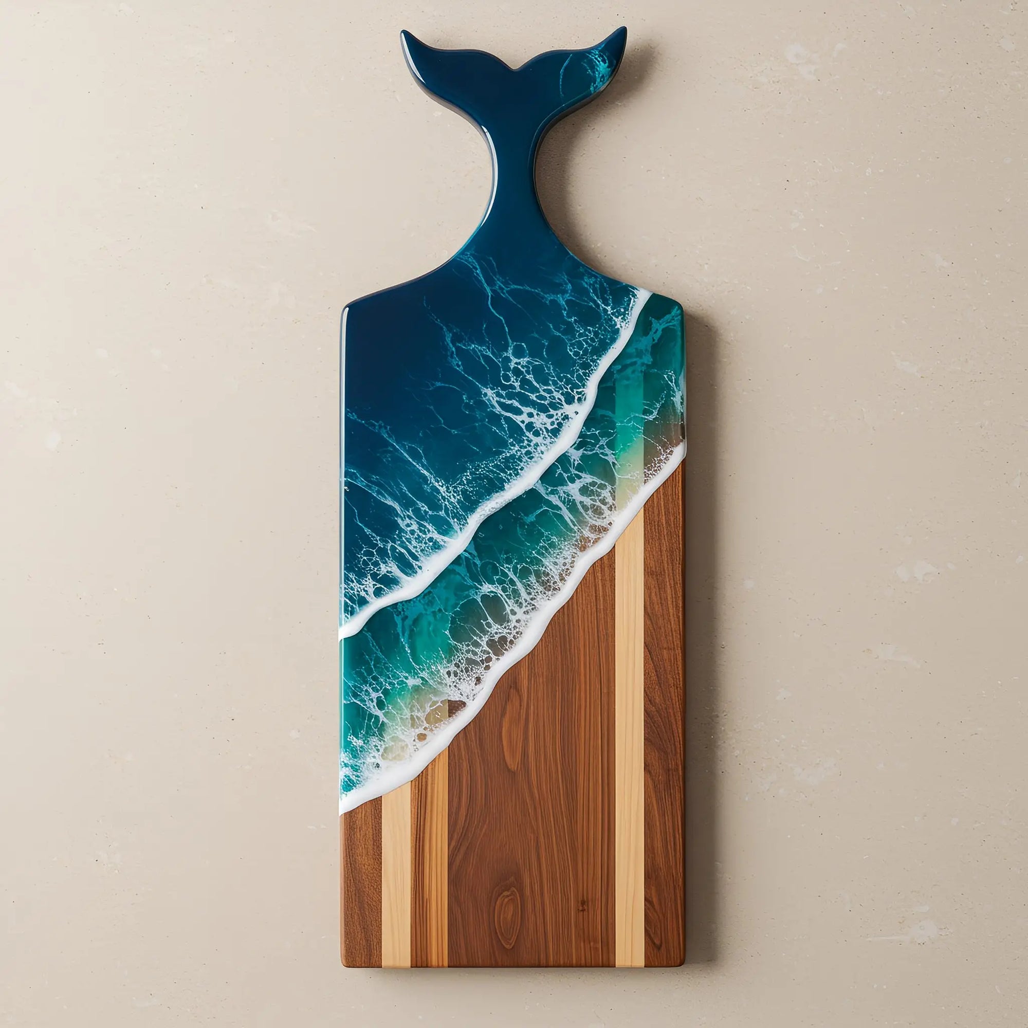 Whale Tail Ocean Resin Charcuterie Board made of acacia wood with blue ocean resin and matching cheese knife