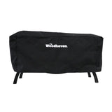 Woodhaven Full Firewood Rack Cover on firewood rack in outdoor setting