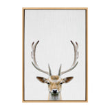Framed portrait of a serene deer with large antlers on a textured white canvas background, emphasizing natural tones and minimalistic style.