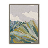 Framed canvas artwork depicting abstract Matterhorn mountains with overlapping geometric shapes in muted blue, green, yellow, and gray tones beneath lavender and cream sky.