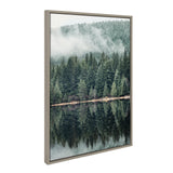 Framed canvas portraying a misty evergreen forest reflected clearly in the still water below, with soft fog blending into the tree line above.