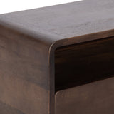 Close-up of a dark brown wooden side table corner with smooth rounded edges and a recessed open shelf beneath the tabletop