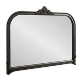 Rectangular wall mirror with an arched top and dark ornate frame featuring a shell-like crest and twisted rope detailing around the edges.