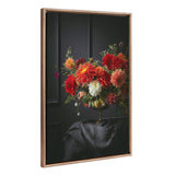 Tall canvas print of a vibrant floral arrangement with red, orange, and white flowers in a golden vase on a dark draped cloth against a charcoal panel background.