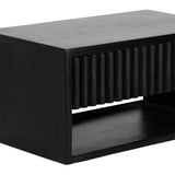 Black rectangular wood side table with an open storage space and vertically grooved front panel detail, shown against a white background.