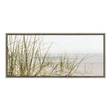 Framed canvas of sparse beach grass with light green and tan hues on sand against a pale sky and distant ocean horizon in soft, muted tones.