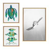 Three framed canvas prints featuring sea turtle motifs displayed together