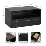 Black rectangular floating side table with curved corners, featuring one large drawer and open shelf, made of solid black mango wood.