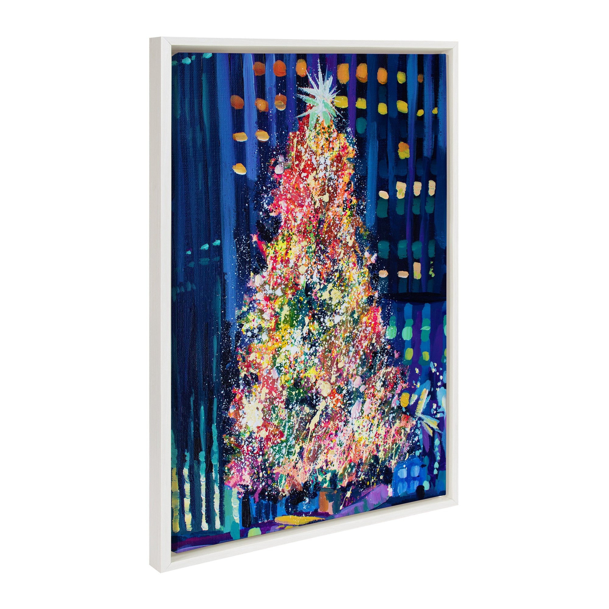 Framed canvas art showing the Rockefeller Center Christmas tree with colorful lights and decorated plaza