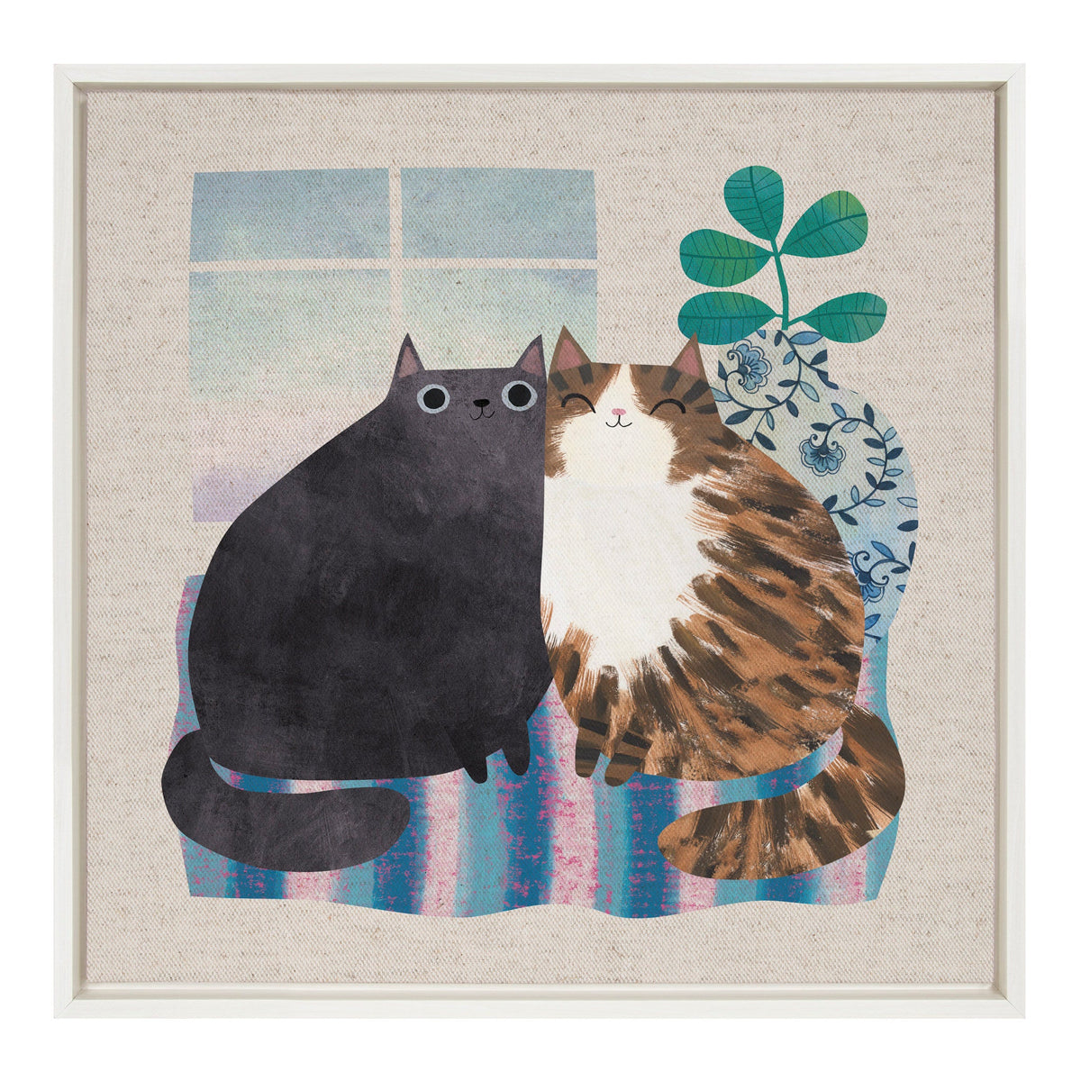 Framed canvas artwork of two stylized cats sitting side by side on a blue-striped blanket, with a patterned vase holding green leaves behind them.