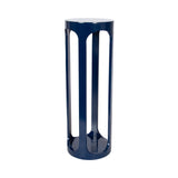 Tall, cylindrical dark blue metal side table with elongated oval cutouts and a solid round top, shown on a white background