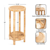 Round two-tier wicker side table with natural rattan wrapping on the frame, featuring 12.25-inch diameter shelves and 28-inch height for display and storage.