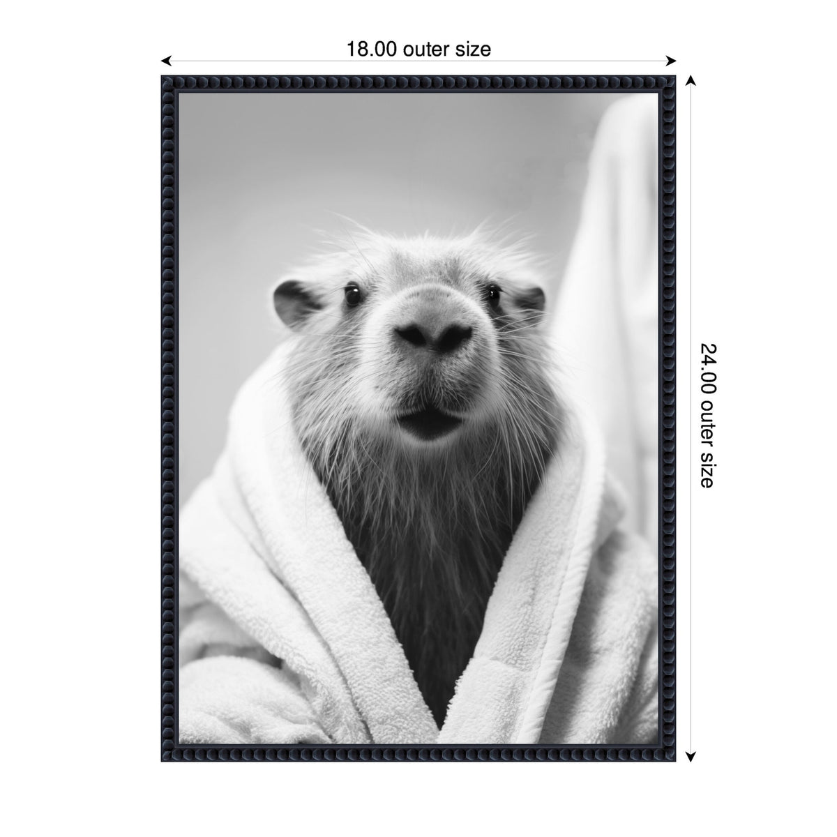 Black and white close-up portrait of a capybara wrapped in a towel looking directly at the camera with a calm expression