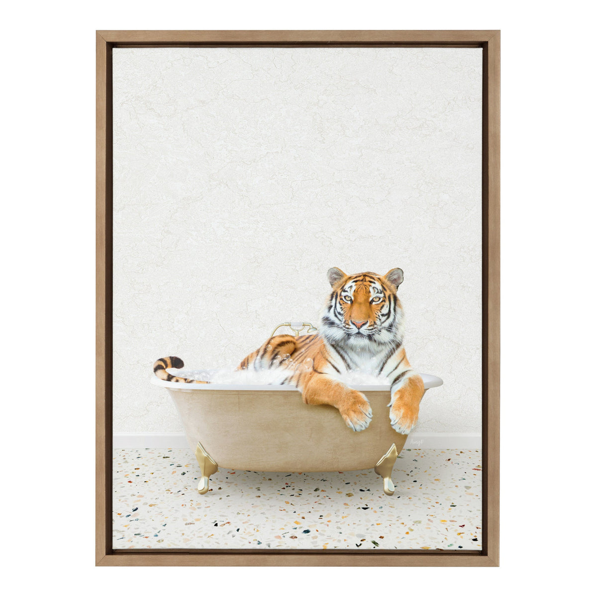 Orange and black striped tiger lounging in a cream clawfoot bathtub filled with bubbles, set against a light terrazzo floor and off-white textured wall.