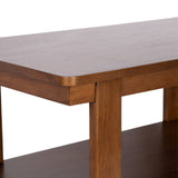 Close-up of rectangular wooden coffee table corner with smooth, rounded edges and a lower shelf in a medium brown finish.