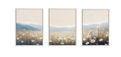Framed canvas art set depicting soft painterly summer meadows with wildflowers and greenery