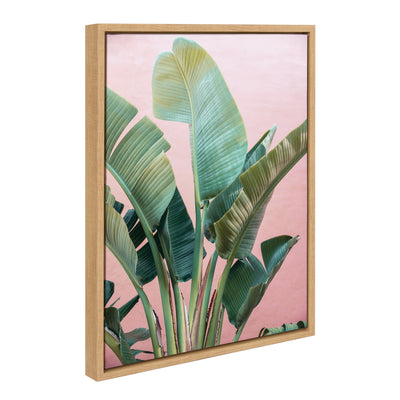 Sylvie Tropic Pink framed canvas showing tropical plants on a pink backdrop