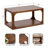 Rectangular coffee table with a rich walnut finish, solid mango wood construction, and open sides featuring an arched design, measuring 36" by 20" by 18" tall.