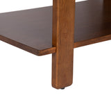 Close-up of a Foxford Rectangle Coffee Table's corner showing smooth walnut wood grain and the vertical leg intersecting the horizontal lower shelf with a clean, minimalist join.