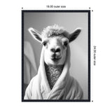 Black and white portrait of a llama wearing a bathrobe, centered with soft lighting and neutral background, framed with a dark ornate border