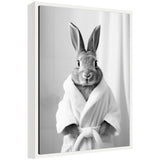 Black and white framed canvas art titled Sylvie Bunny Bathroom Art Towel Robe by The Creative Bunch Studio