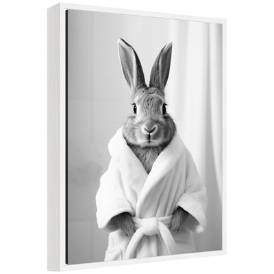 Black and white framed canvas art titled Sylvie Bunny Bathroom Art Towel Robe by The Creative Bunch Studio